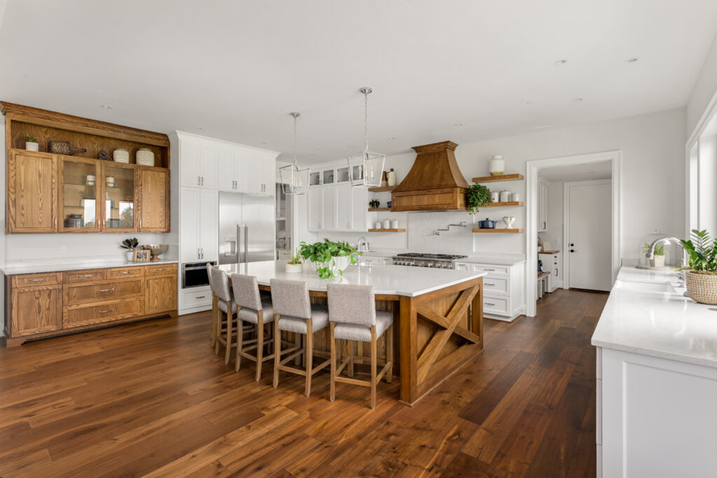 Freshly stained hardwood floor showcasing a rich, polished finish after restoration.