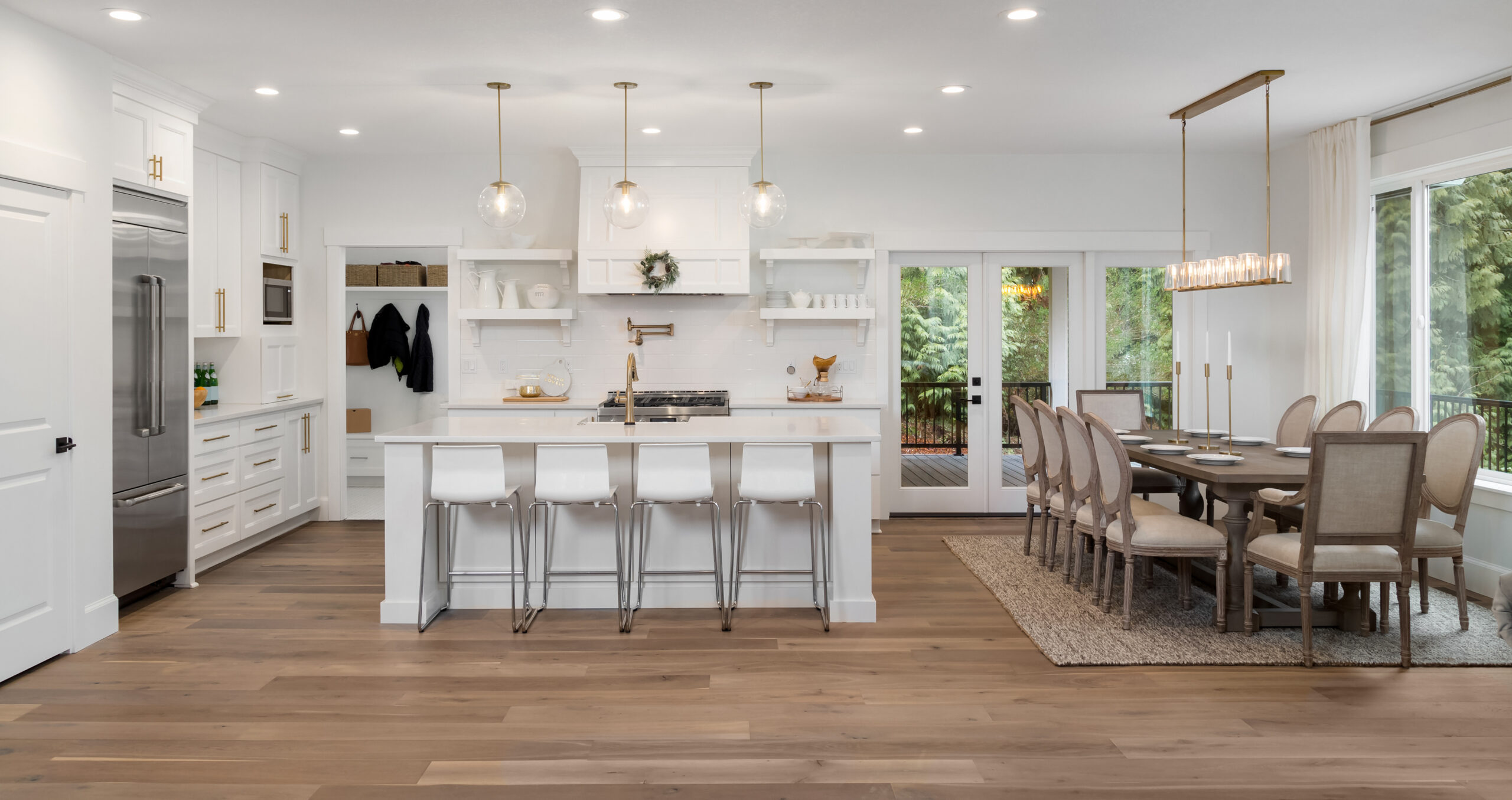 A modern living room showcasing the results of switching from carpet to hardwood, with sleek, polished wooden floors enhancing the space's elegance.