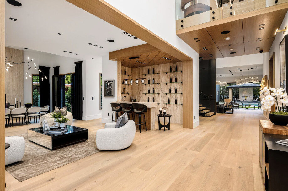 Modern open concept room with custom floors.